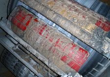 Skalper conveyor belt cleaner at a cement plant